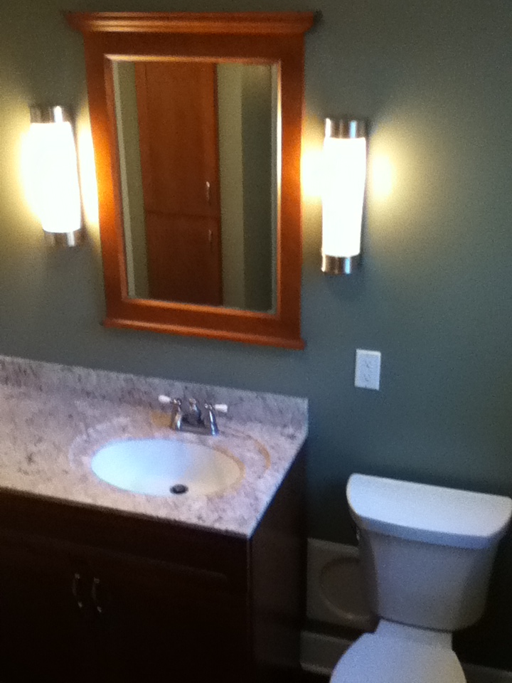 Remodeled Bathroom Vanity and Framed Mirror