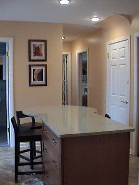 Looking into the hallway from kitchen where old wall once was.