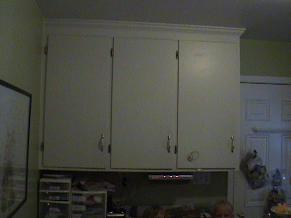 Wall cabinets where fridge was to be relocated.