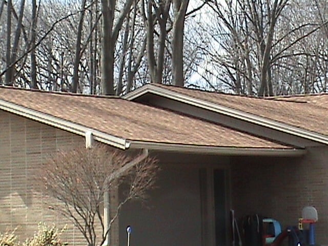 Detail of the new shingles installed of the garage of this home.