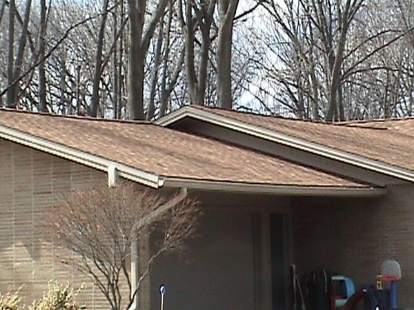 Detail of the new shingles installed of the garage of this home.