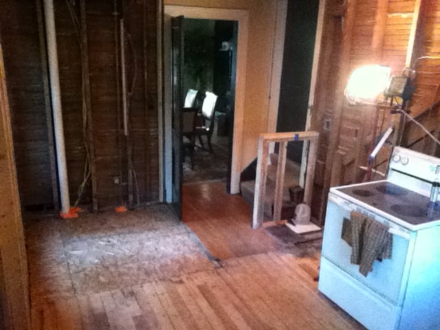 Half Bath, hallway, and kitchen demolished into one room.